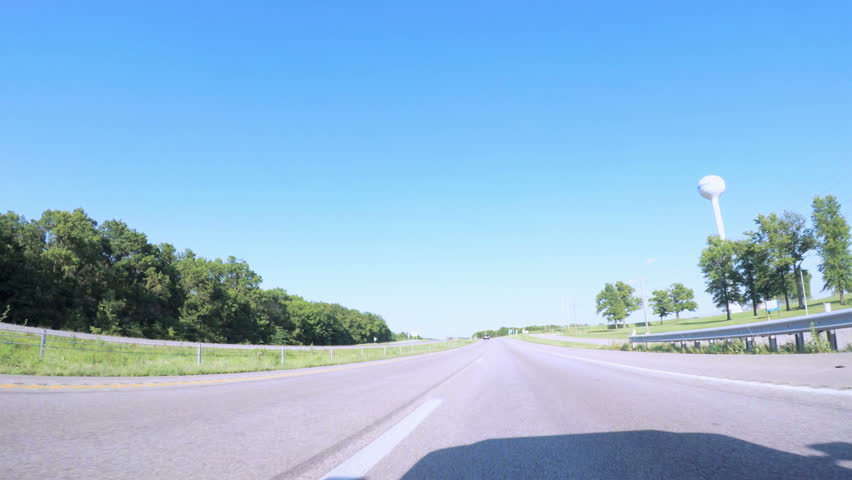 St. Louis, Missouri, USA-July 8, 2017. Time lapse. POV point of view - Driving East on Interstate Highway 70.