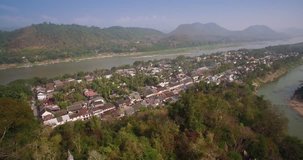 Historic City Of Luang Prabang On The Mekong River And Mount Phousi, Laos, Aerial Slider Shot