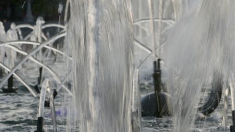 Ungraded: Water jets pour from the pipes of city fountain. Ungraded H.264 from camera without re-encoding. (av38463u)