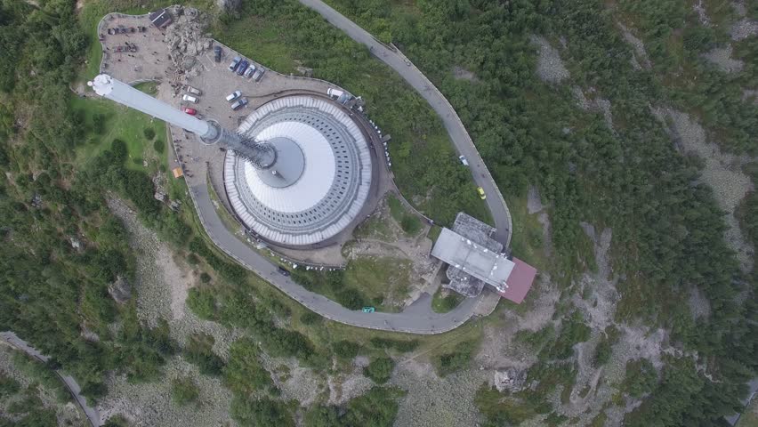 Building on hill from drone - elevating