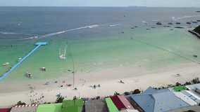 4K Aerial view of beach to the sea at Ko Lan, Pattaya