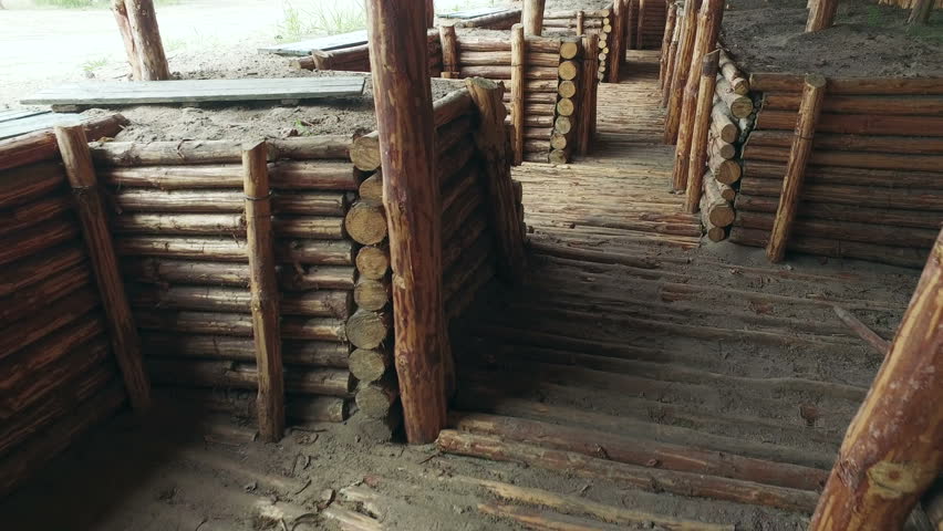 entrenchment of logs and boards military trenches on the battlefield. Command headquarters