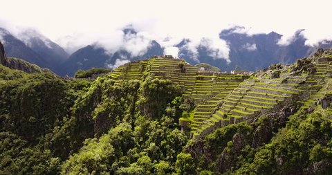 Machu Picchu Peru Aerial v8 Flying low around ancient ruins panning