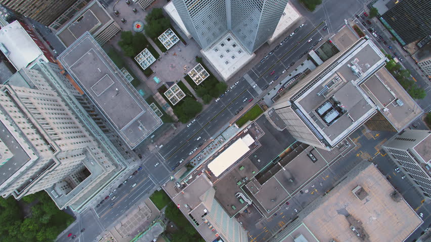 Montreal Quebec Aerial v73 Flying low over downtown buildings looking down vertically