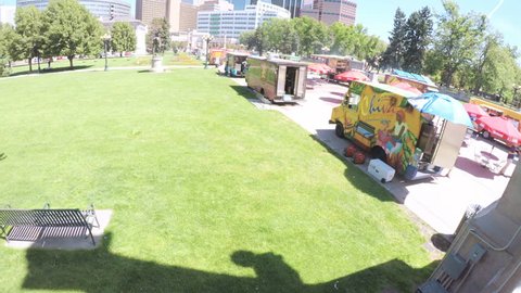Denver, Colorado, USA-June 15, 2017.  POV point of view - Lunch time gathering of gourmet food trucks at the Civic Center Park.