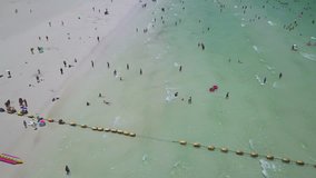 4K Aerial view of people and tourist travel in Tawean beach at Ko Lan, Pattaya