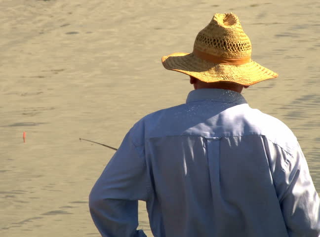 Fishermen fishing on the river, closeup.