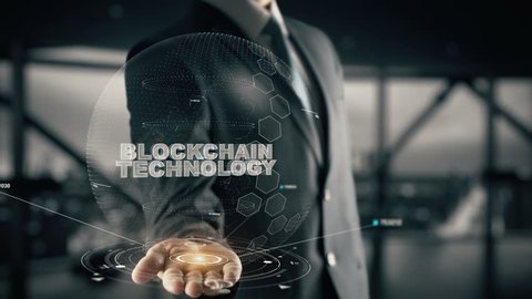 Blockchain Technology with hologram businessman concept