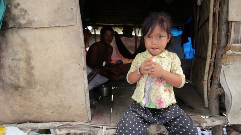 Father and daughter in Cambodian slums
