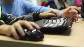 Gamers play on modern computers online games in the competition.