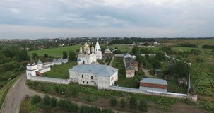 4K aerial video footage of ancient old Luzeckiy Ferapontov Monastery with its towers, walls, churches and cathedrals in Mozaisk town on quiet summer afternoon, western Russia, 100 km from Moscow