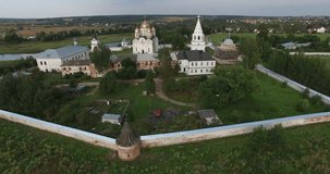 4K aerial video footage of ancient old Luzeckiy Ferapontov Monastery with its towers, walls, churches and cathedrals in Mozaisk town on quiet summer afternoon, western Russia, 100 km from Moscow