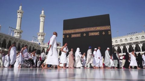 MAKKAH, SAUDI ARABIA - FEB 20: Muslim pilgrims circumambulate the Kaaba at Masjidil Haram on February 20, 2012 in Makkah, Saudi Arabia. Muslims all around the world face the Kaaba during prayer time.