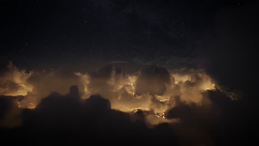 Flying over the deep night timelapse clouds with dark sky. Seamlessly looped animation. Flight through moving cloudscape over night city lights. Perfect for cinema, background, digital composition. Royalty-Free Stock Footage #30396358