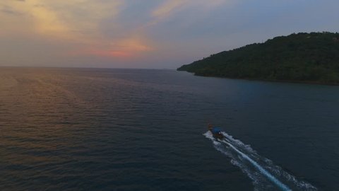 beautiful sunrise with long-tail boats