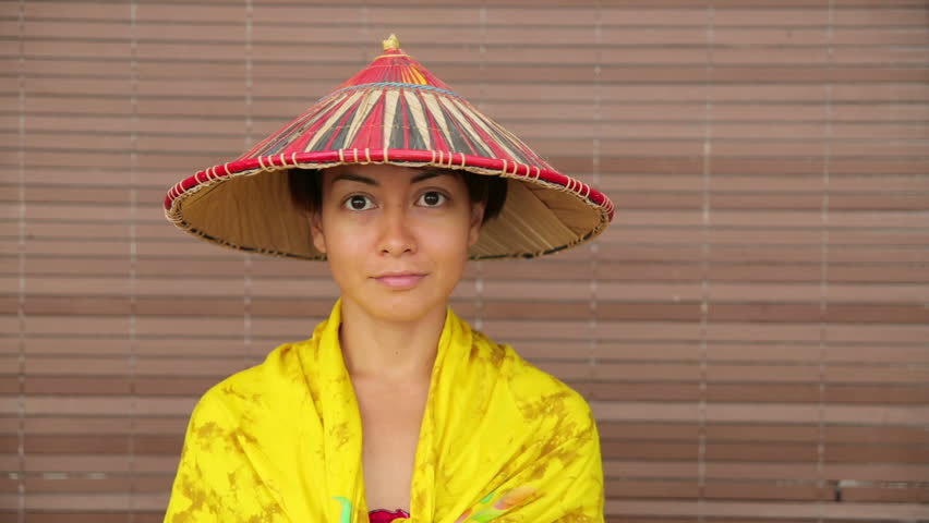 Attractive Asian lady with hat