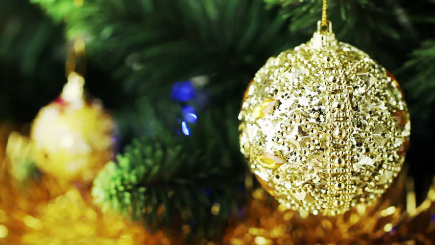 Christmas Bell turns on the Christmas tree closeup