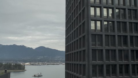 Time Lapse of Vancouver / North Shore: Highrise Office, Burrard Inlet, Clouds 4K