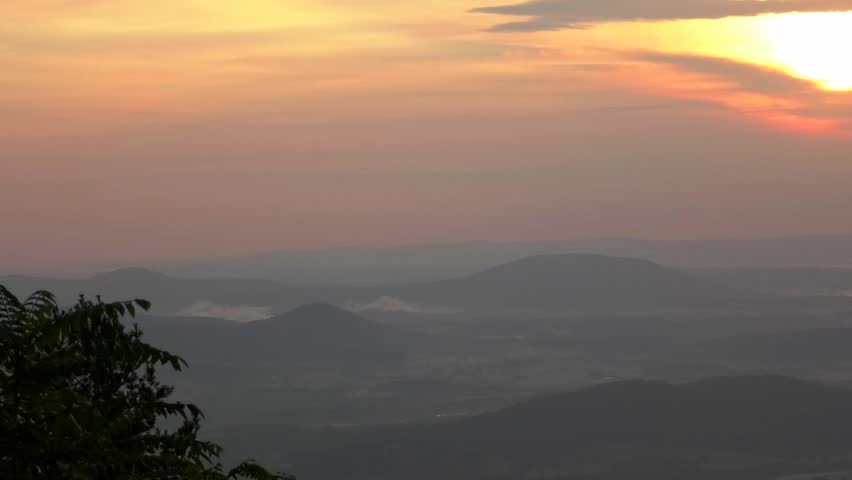 Clouds rain fog and sunrise from Skyline Drive in the Shenandoah National Park