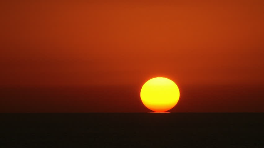 Beautiful Sunrise / Sunset (if inverted) time-lapse. Sun close up.