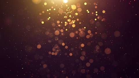 Abstract glittering gold with bokeh and dust effect . Black background . Arkivvideo