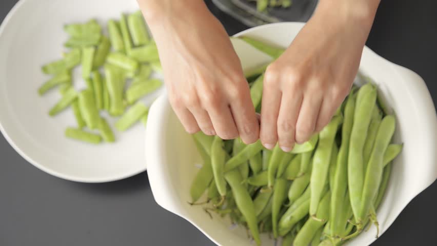 Woman Preparing Green Beans For Lunch