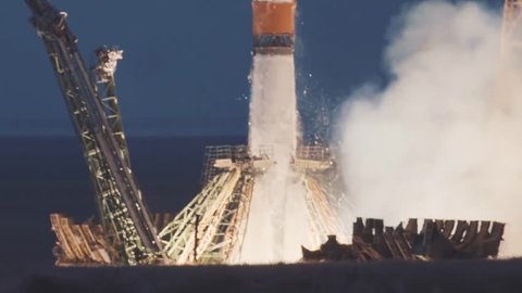 BAIKONUR, KAZAKHSTAN - JULE 28: Russian rocket take off. The spacecraft launches into space, the astronauts fly away from planet earth for docking in the International Space Station