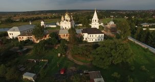 4K aerial video footage of ancient old Luzeckiy Ferapontov Monastery with its towers, walls, churches and cathedrals in Mozaisk town on quiet summer afternoon, western Russia, 100 km west of Moscow