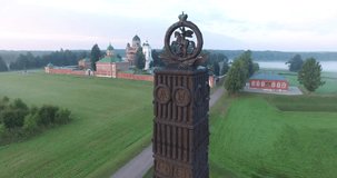4K aerial video footage view of old beautiful 1812 war military memorial, Spaso-Borodinski monastery, green fields around it in Borodino 120 km west of Moscow, capital of Russia on summer morning
