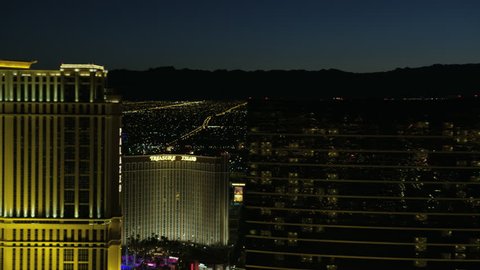 Las Vegas - May 2017: Aerial night Cityscape view of Downtown Resort hotels and Casinos city homes residential suburbs Nevada USA RED WEAPON