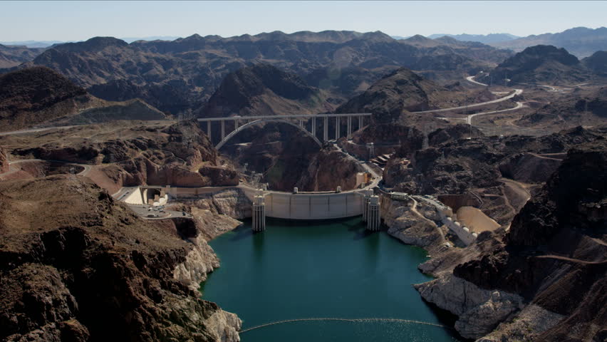 Aerial view Hoover Dam on US 93 tourist destination with Colorado River Bypass bridge and Lake Mead Nevada Arizona America RED WEAPON