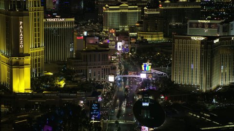 Las Vegas - May 2017: Aerial illuminated night view of Las Vegas Blvd luxury Resort Hotels and Casinos city suburbs Nevada USA RED WEAPON