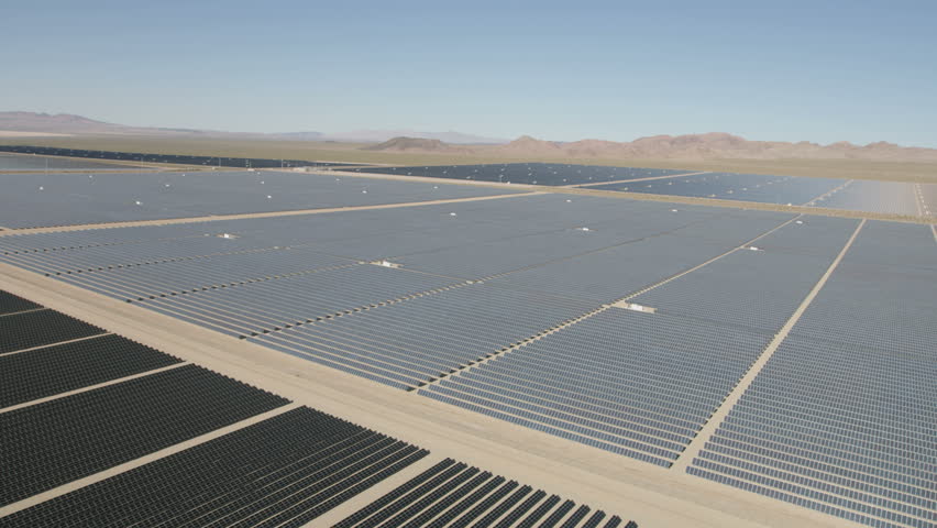 Aerial desert view Photovoltaic solar panels harvesting clean energy from the sun natural alternative power Las Vegas Nevada USA RED WEAPON | Shutterstock HD Video #30458209