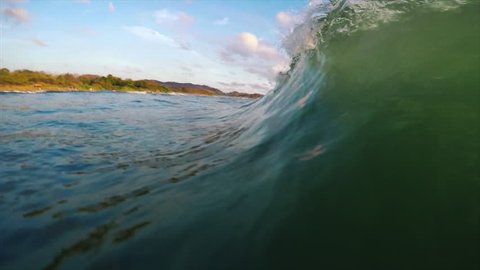 Ocean wave surfing POV