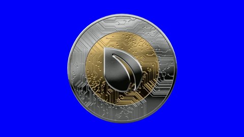 A rotating peercoin cryptocurrency physical gold and silver coin on a blue screen background