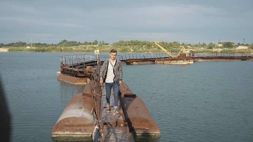 Man walks on the steel bay