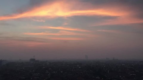 Time laps, City skyline sunrise in the morning at Surabaya.