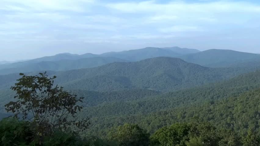Clouds and fog over Shenandoah Valley from Skyline Drive just after sunrise