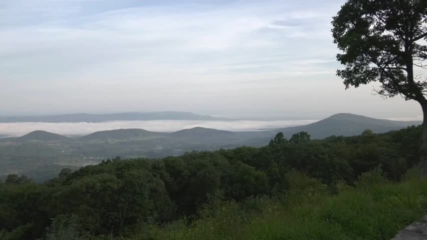 Clouds and fog over Shenandoah Valley from Skyline Drive just after sunrise
