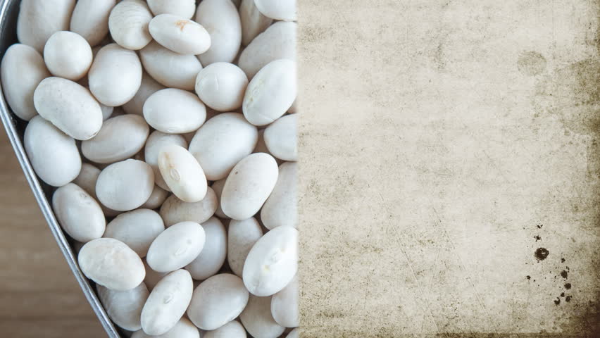 White kidney beans in a heart shape. Concept for healthy eating. Copy space on the side to write text