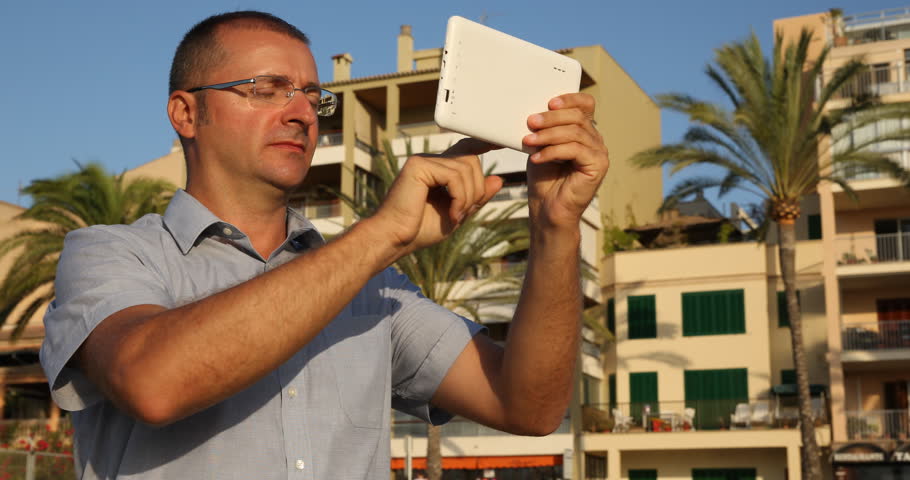 Man Browse Digital Tablet Modern Technology Tropical Apartment Island Palm Trees