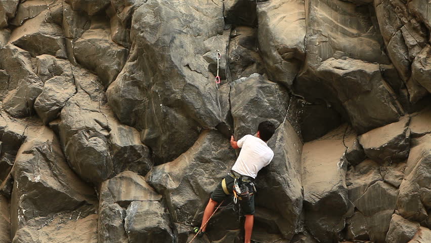 Rock climbing on a ideal vertical wall.
