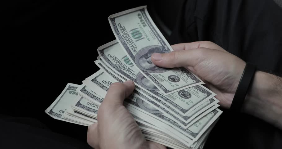 Bundle of Dollars in the Stock Footage Video (100% Royalty-free