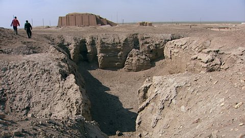 TELL EL MUQAYYAR, IRAQ - CIRCA 2002: Archaeological site Ur. Ziggurat and Woolley's Flood Pit. Ur was an important Sumerian city in ancient Mesopotamia located at the site of modern Tell el-Muqayyar.