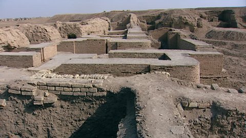 TELL EL MUQAYYAR, IRAQ - CIRCA 2002: Archaeological site Ur. pan-left over the Royal Cemetery excavated by Sir Leonard Woolley. It included over 2000 burials among which sixteen identified as royal.