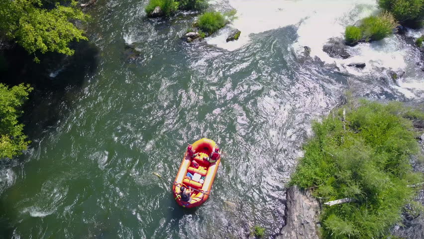 Overhead Aerial Shot of Rafting Boat on Raging River with Rapids 4K
