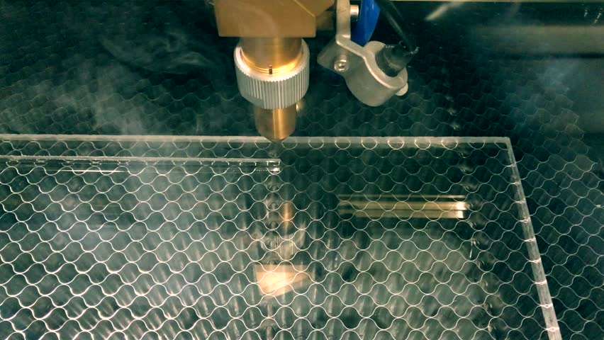 Engraving plastic plate with laser. 