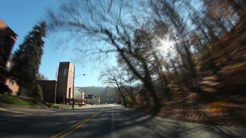 Time lapse shot of driving through the former steel town of Aliquippa, about 18