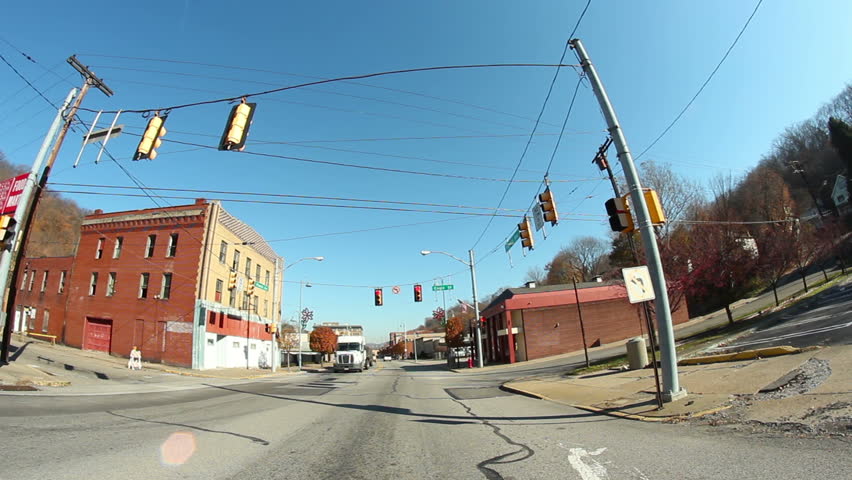 Time lapse shot of driving through the former steel town of Aliquippa, about 18