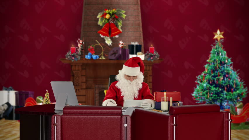 Santa Claus reading letters and sorting presents, office with Christmas